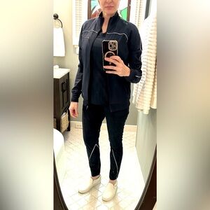 Jaanuu Ultralite tech fabric scrub jacket in navy blue size XS NWOT